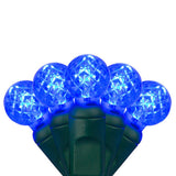70 Blue G12 LED String Lights, Green Wire, 4" Spacing