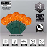 70 Amber/Orange G12 LED String Lights, Green Wire, 4" Spacing - BulbAmerica